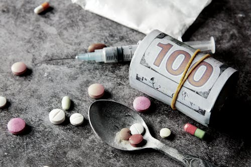 Medication-assisted addiction treatment with naltrexone and opioid recovery concept