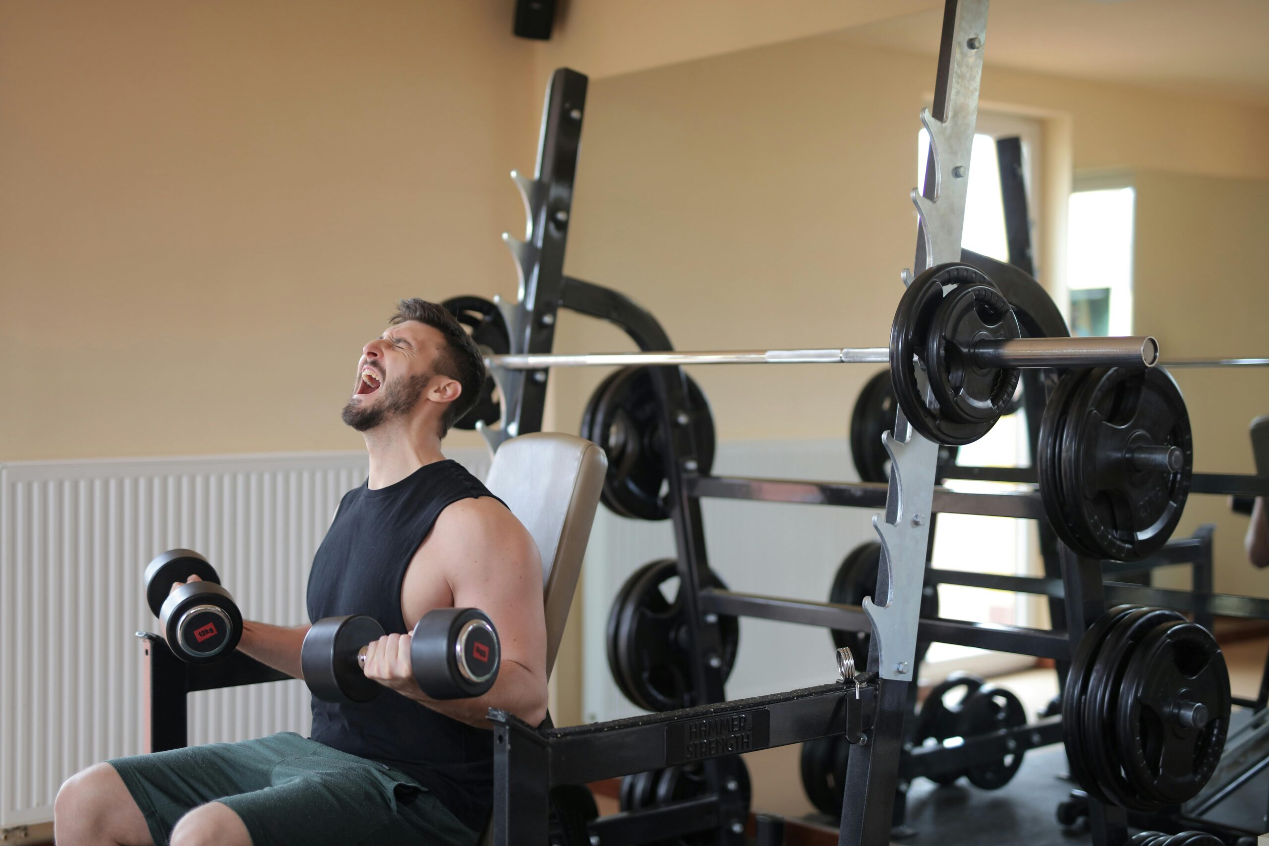 Person performing a gym exercise with proper form to avoid common gym mistakes and improve strength, fitness, and workout results safely.