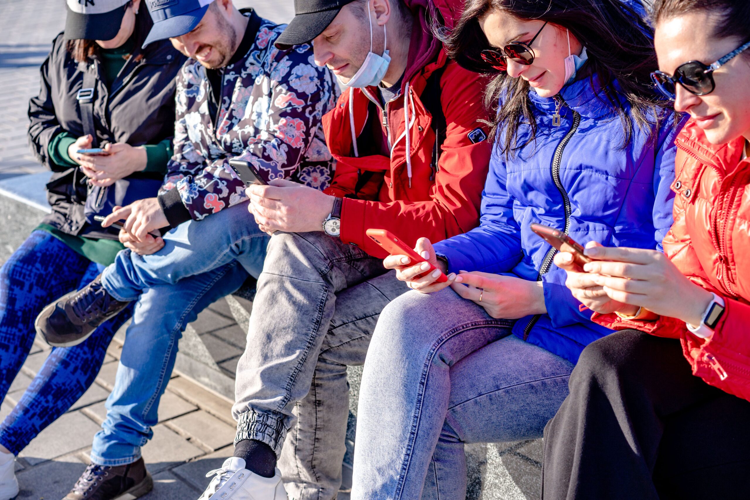 Person using a smartphone with social media apps, illustrating digital addiction, screen time habits, and online engagement.